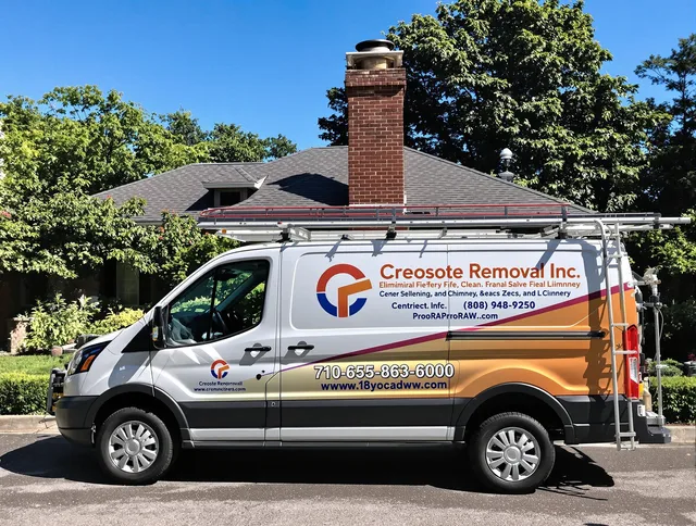 Windsor Chimney Sweep technician removing creosote safely in Windsor, CT