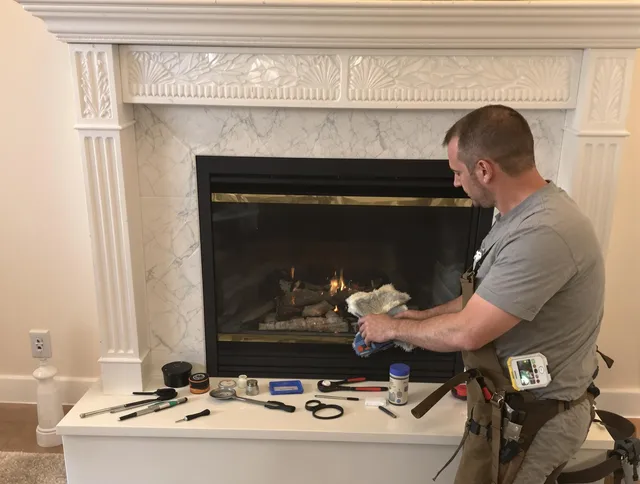 Windsor Chimney Sweep performing fireplace maintenance in Windsor, CT